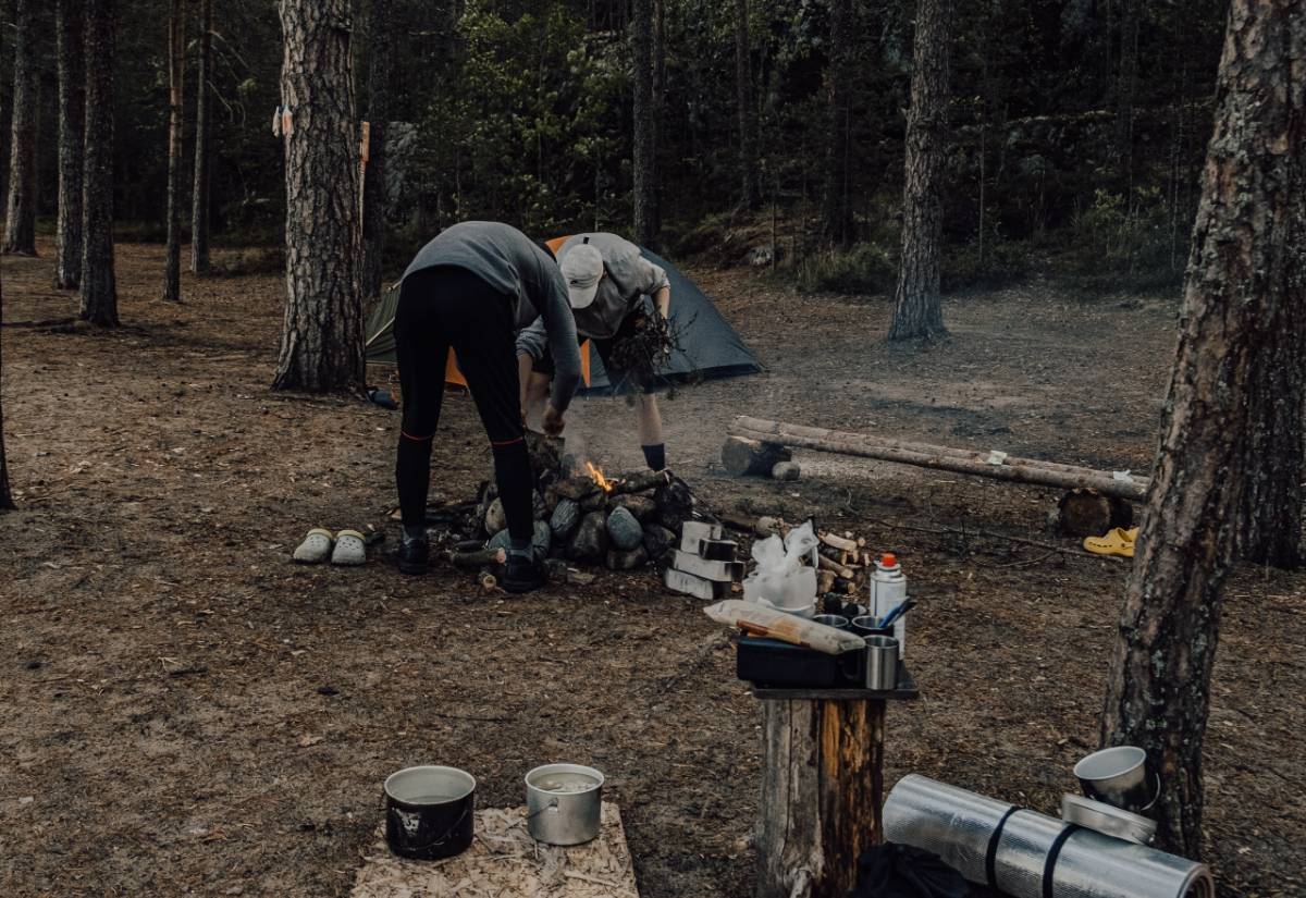 Gather kindle, rocks, and set up fire pit