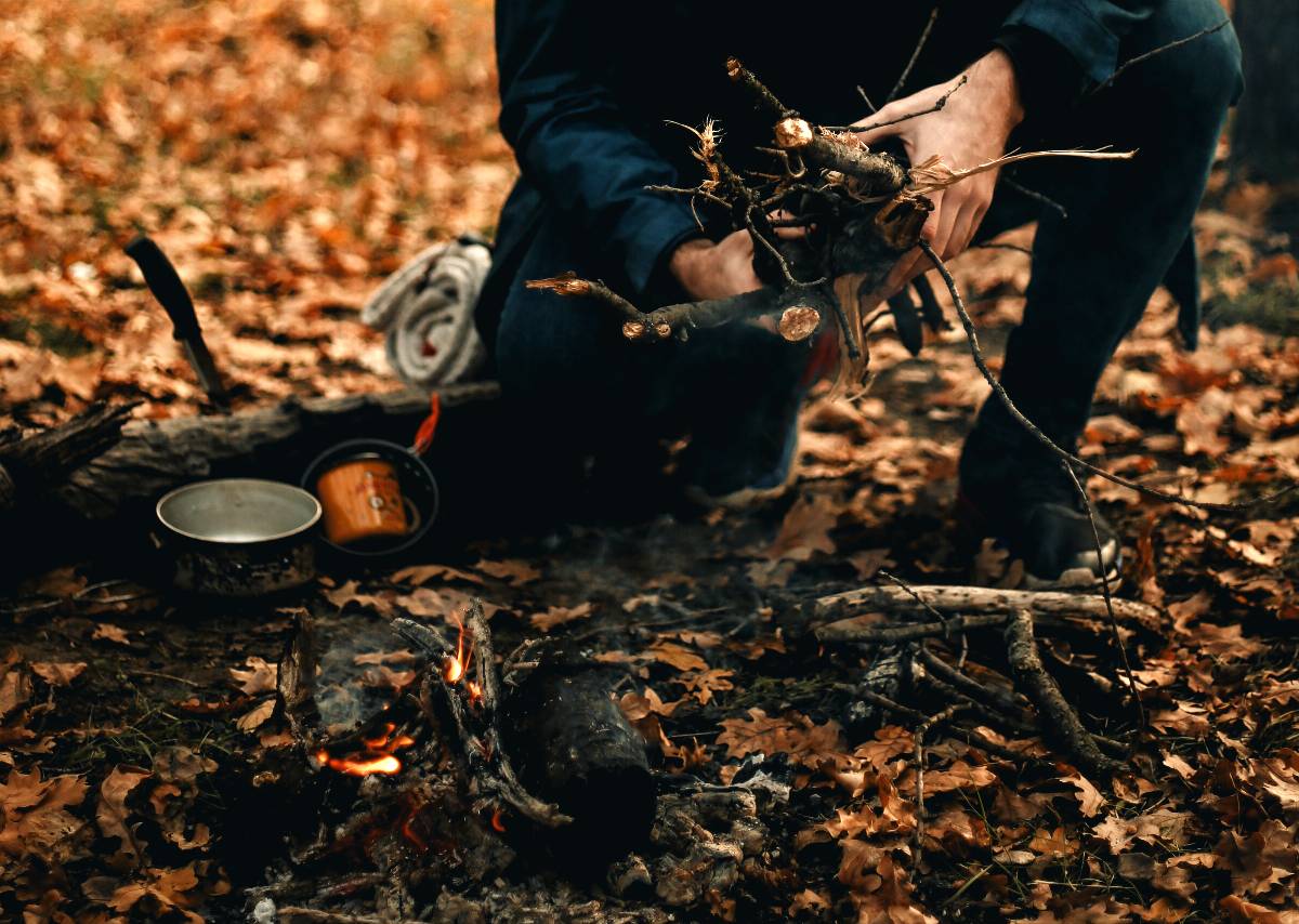 Gathering kindling and wood for building a campfire